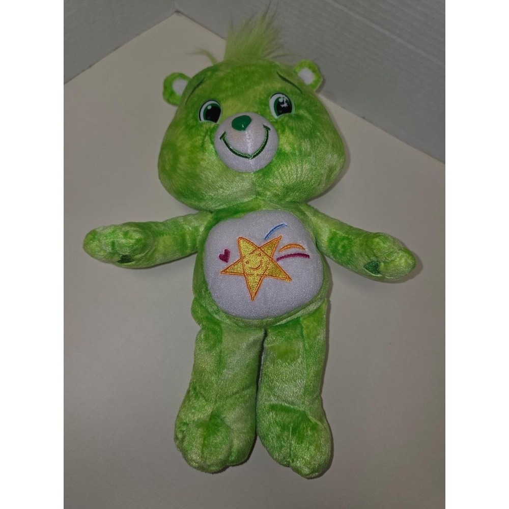 2007 Jakks Pacific Oopsy‎ Care Bear plush featuring mottled green tie-dye fur